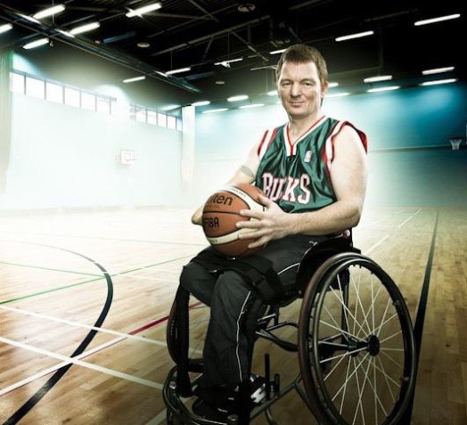 Andy Atkinson speaker in wheelchair in hall